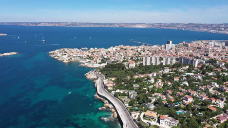 Marseille-coastal-road-and-residential-area-France-aerial-drone-shot-sunny-day